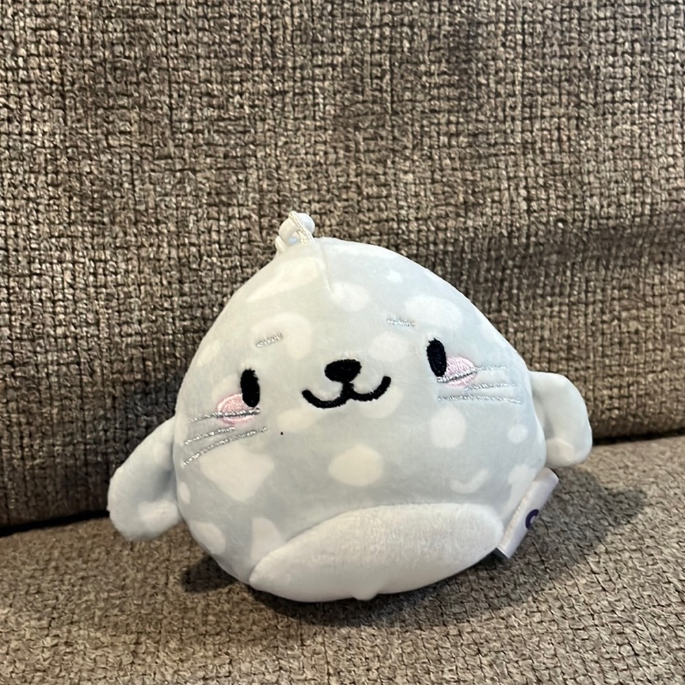 A seal squishmallow keychain